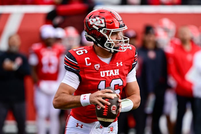 Oct 28, 2023; Salt Lake City, Utah, USA; Utah Utes quarterback Bryson Barnes (16) steps out of the pocket against the Oregon Ducks during the first half at Rice-Eccles Stadium.
